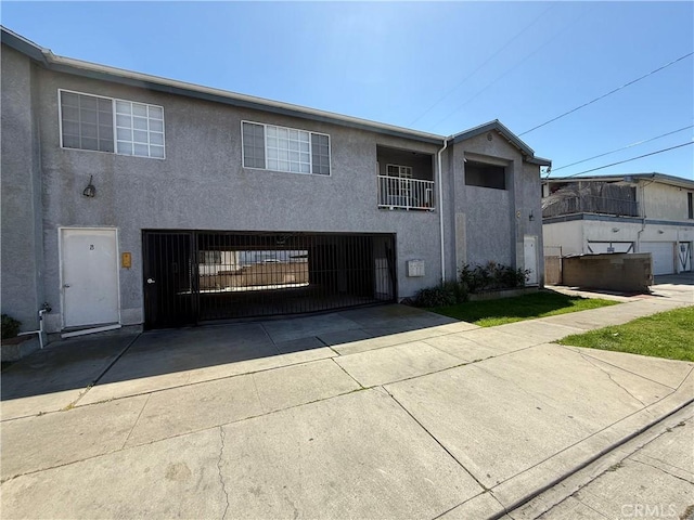 3702 W 126th St, Hawthorne, CA 90250 - view of front of property with concrete driveway, stucco siding, and an attached garage