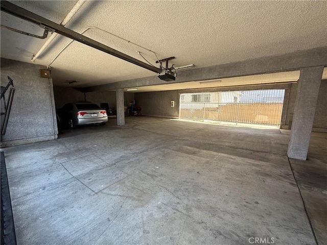 3702 W 126th St, Hawthorne, CA 90250 - garage featuring a garage door opener