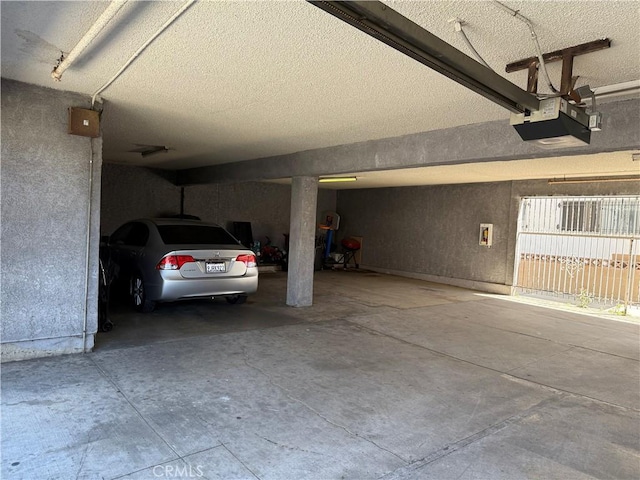 3702 W 126th St, Hawthorne, CA 90250 - garage featuring a garage door opener