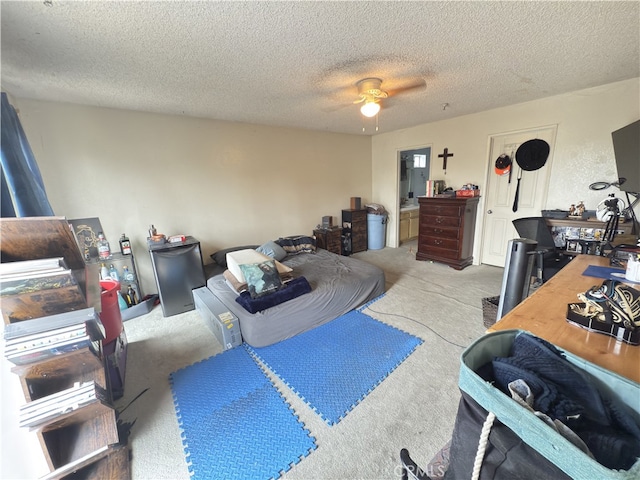 3702 W 126th St, Hawthorne, CA 90250 - carpeted bedroom featuring ensuite bathroom, ceiling fan, and a textured ceiling
