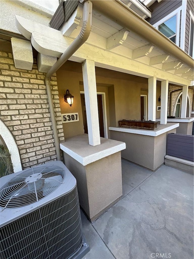 exterior space with central air condition unit
