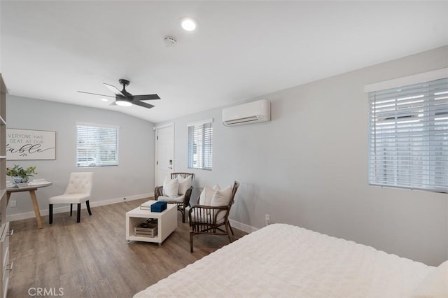 653 Joann St, Costa Mesa, CA 92627 - bedroom with baseboards, multiple windows, wood finished floors, and a wall mounted air conditioner