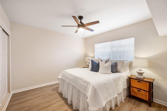 653 Joann St, Costa Mesa, CA 92627 - bedroom with a closet, baseboards, ceiling fan, and light wood-style floors