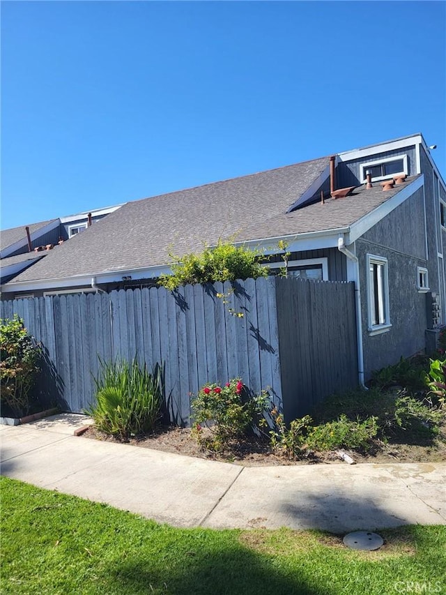 601 S Newhope St Unit 5, Santa Ana, CA 92704 - view of home's exterior featuring fence