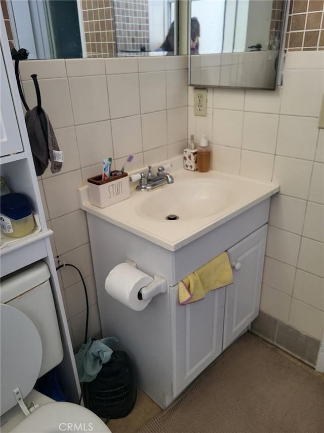 601 S Newhope St Unit 5, Santa Ana, CA 92704 - bathroom with tile walls, vanity, and toilet