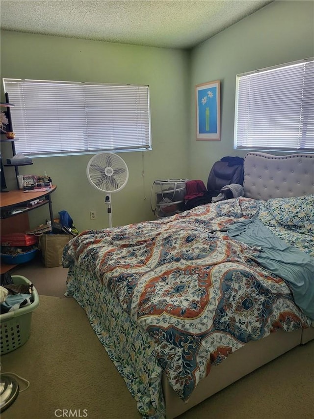 601 S Newhope St Unit 5, Santa Ana, CA 92704 - bedroom featuring carpet flooring and a textured ceiling