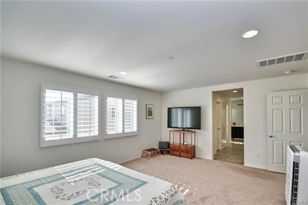 5374 Mission Rock Way, Jurupa Valley, CA 92509 - bedroom featuring baseboards, visible vents, carpet floors, and recessed lighting