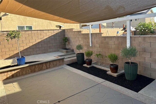 5374 Mission Rock Way, Jurupa Valley, CA 92509 - view of patio featuring fence