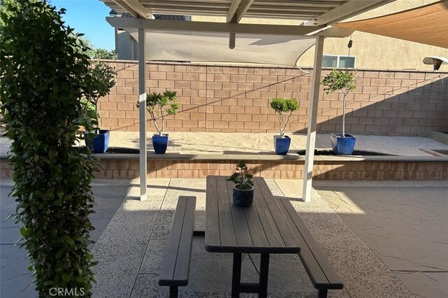 5374 Mission Rock Way, Jurupa Valley, CA 92509 - view of patio / terrace with fence