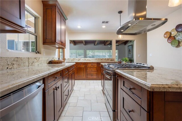 3192 Lytle Creek Rd, Lytle Creek, CA 92358 - kitchen with stainless steel appliances, exhaust hood, light stone counters, recessed lighting, and hanging light fixtures