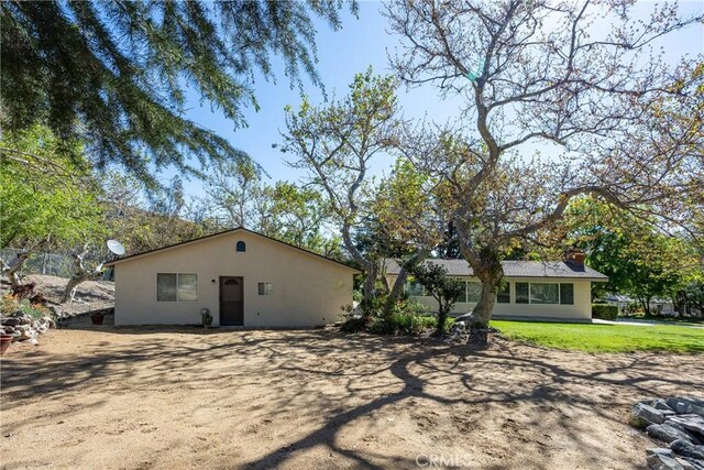 3192 Lytle Creek Rd, Lytle Creek, CA 92358 - back of property featuring stucco siding