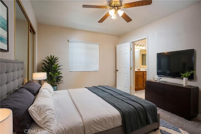 3192 Lytle Creek Rd, Lytle Creek, CA 92358 - bedroom featuring light colored carpet, connected bathroom, and ceiling fan