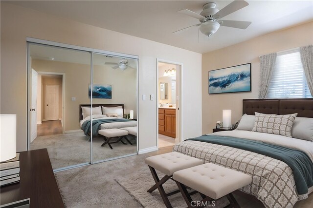 3192 Lytle Creek Rd, Lytle Creek, CA 92358 - bedroom featuring light carpet, a closet, connected bathroom, ceiling fan, and baseboards