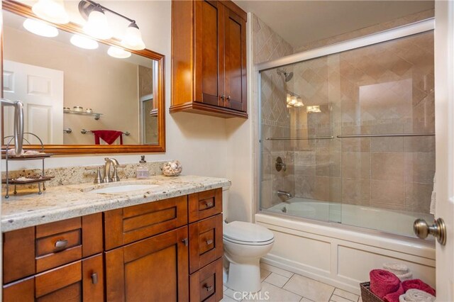 3192 Lytle Creek Rd, Lytle Creek, CA 92358 - full bath featuring vanity, toilet, tile patterned floors, and enclosed tub / shower combo