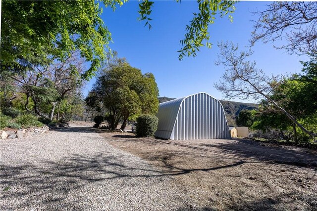 3192 Lytle Creek Rd, Lytle Creek, CA 92358 - view of yard featuring an outdoor structure
