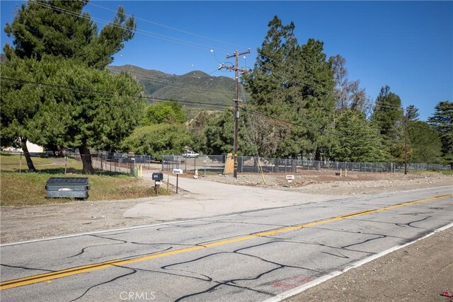 3192 Lytle Creek Rd, Lytle Creek, CA 92358 - view of asphalt road featuring a mountain view