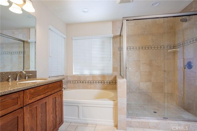 3192 Lytle Creek Rd, Lytle Creek, CA 92358 - bathroom featuring a bath, a shower stall, vanity, tile patterned floors, and recessed lighting