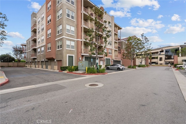 12842 Palm St Unit 301, Garden Grove, CA 92840 - view of building exterior featuring uncovered parking
