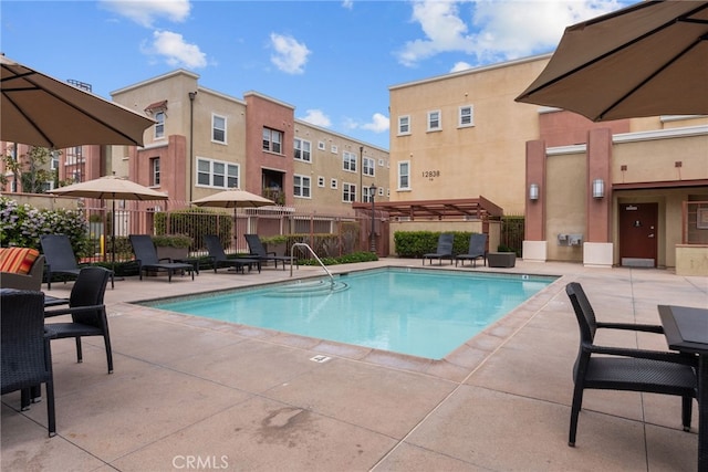 12842 Palm St Unit 301, Garden Grove, CA 92840 - community pool featuring a patio area and a pergola