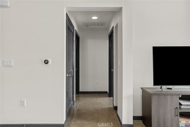 12842 Palm St Unit 301, Garden Grove, CA 92840 - corridor with tile patterned flooring and baseboards