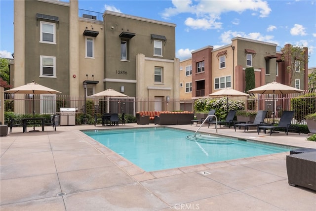 12842 Palm St Unit 301, Garden Grove, CA 92840 - pool with fence and a patio area