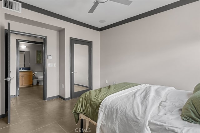12842 Palm St Unit 301, Garden Grove, CA 92840 - bedroom with baseboards, dark tile patterned flooring, visible vents, and ceiling fan