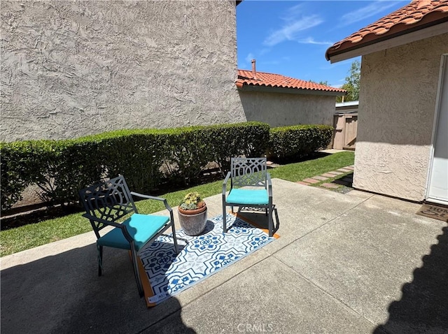 view of patio / terrace with fence