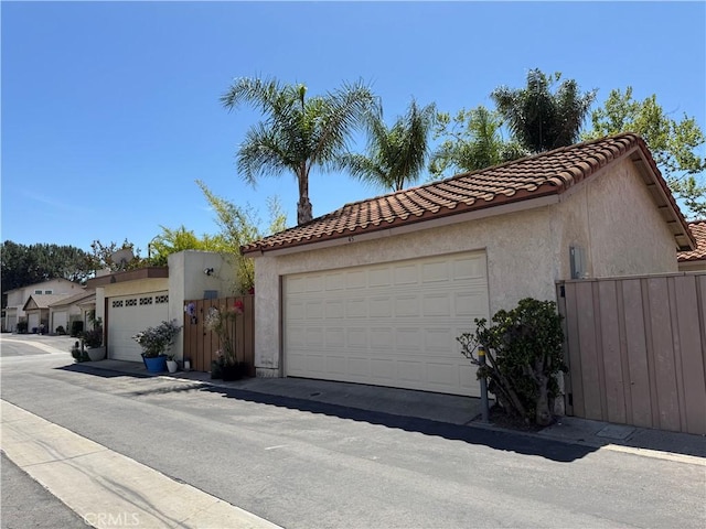 garage with fence
