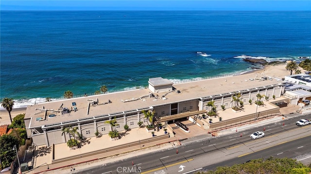 drone / aerial view with a view of the beach and a water view