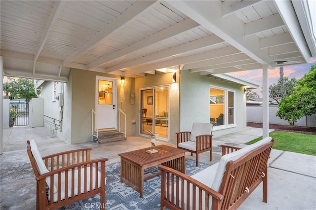 347 E Barkley Ave, Orange, CA 92867 - patio terrace at dusk with a gate, fence, an outdoor living space, and entry steps