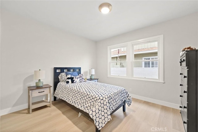 347 E Barkley Ave, Orange, CA 92867 - bedroom featuring baseboards and light wood finished floors