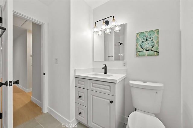 347 E Barkley Ave, Orange, CA 92867 - bathroom featuring baseboards, vanity, and toilet