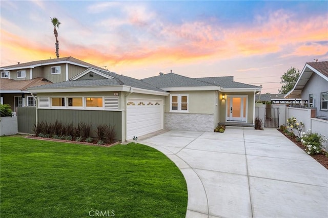 347 E Barkley Ave, Orange, CA 92867 - view of front of house featuring concrete driveway, an attached garage, fence, a front yard, and stucco siding