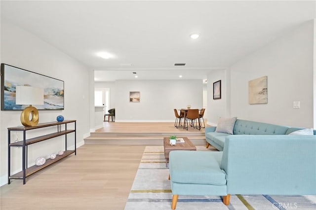 347 E Barkley Ave, Orange, CA 92867 - living area featuring baseboards, visible vents, light wood finished floors, and recessed lighting