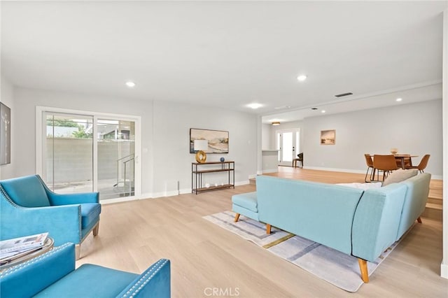 347 E Barkley Ave, Orange, CA 92867 - living room with light wood-type flooring, baseboards, and recessed lighting