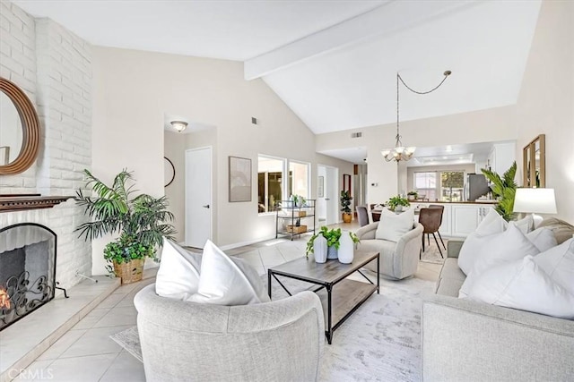 86 Sandpiper Unit 17, Irvine, CA 92604 - living room with visible vents, light tile patterned floors, beamed ceiling, a chandelier, and high vaulted ceiling