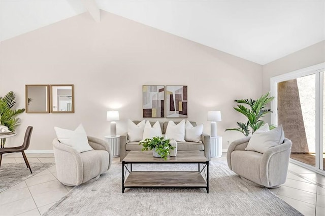 86 Sandpiper Unit 17, Irvine, CA 92604 - living area with high vaulted ceiling, baseboards, beam ceiling, and tile patterned floors