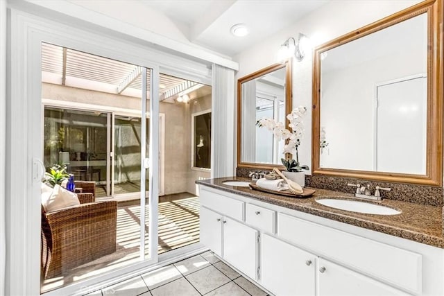 86 Sandpiper Unit 17, Irvine, CA 92604 - full bathroom with tile patterned flooring, a sink, and double vanity
