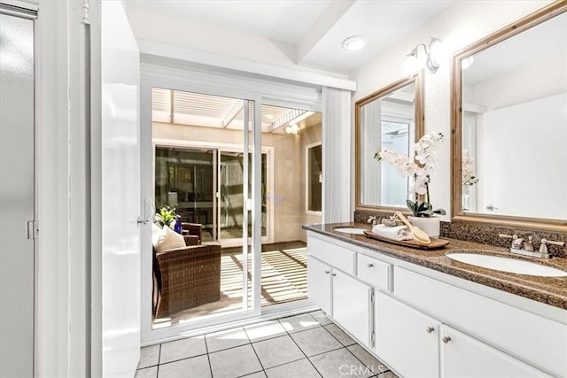 86 Sandpiper Unit 17, Irvine, CA 92604 - bathroom with double vanity, tile patterned floors, and a sink