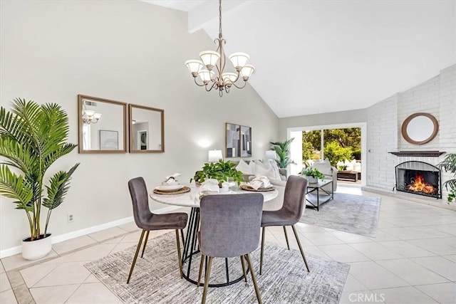 86 Sandpiper Unit 17, Irvine, CA 92604 - dining room with light tile patterned flooring, baseboards, an inviting chandelier, a brick fireplace, and high vaulted ceiling
