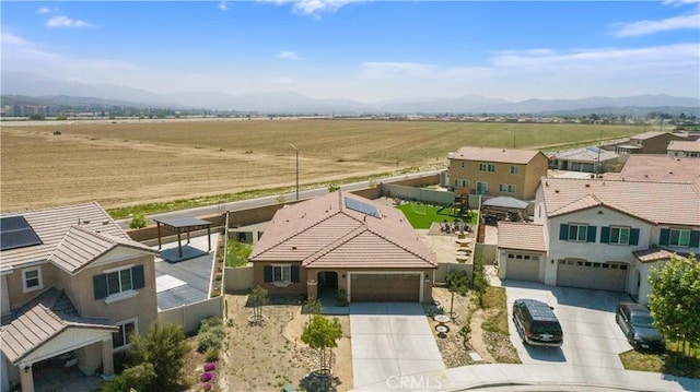 bird's eye view with a mountain view and a rural view