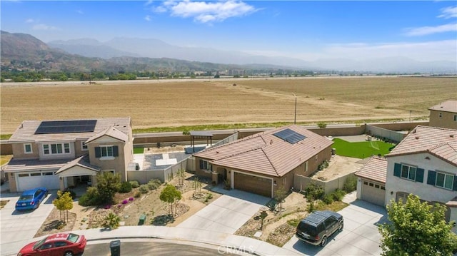 aerial view featuring a mountain view and a rural view