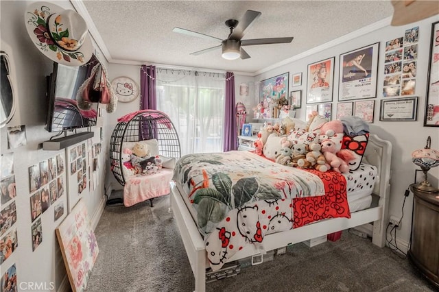 bedroom featuring a textured ceiling, carpet flooring, a ceiling fan, and ornamental molding
