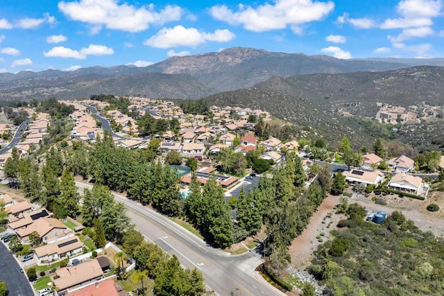bird's eye view with a residential view and a mountain view