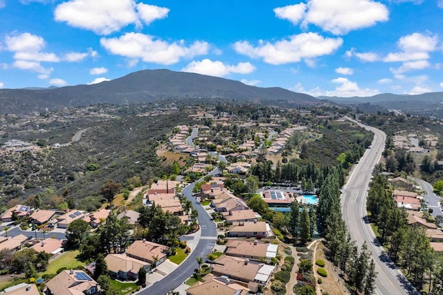 bird's eye view featuring a residential view and a mountain view