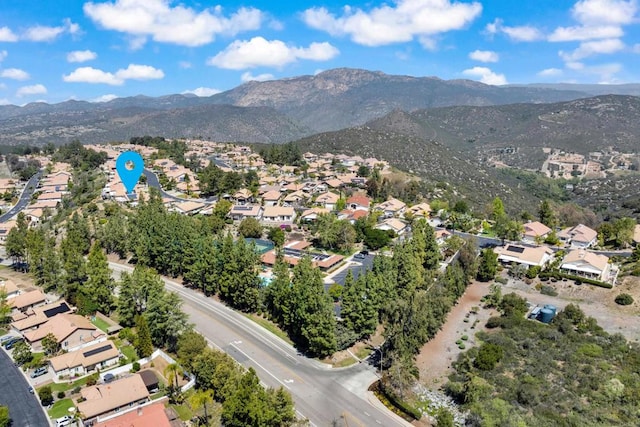 birds eye view of property featuring a residential view and a mountain view