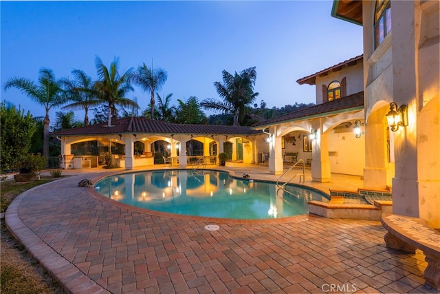 pool with a patio