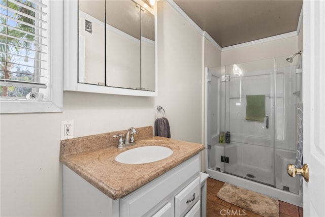 bathroom with vanity, tile patterned floors, and a stall shower