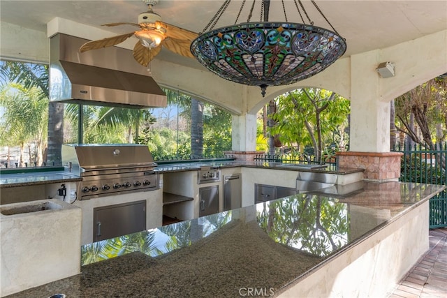 view of patio / terrace with grilling area, a ceiling fan, a sink, and area for grilling