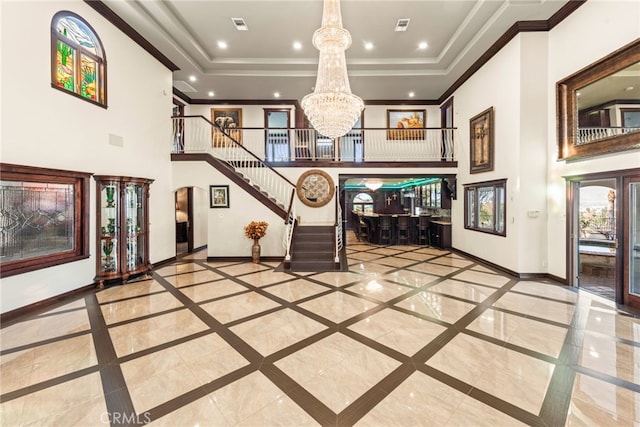 lobby featuring visible vents and stairs